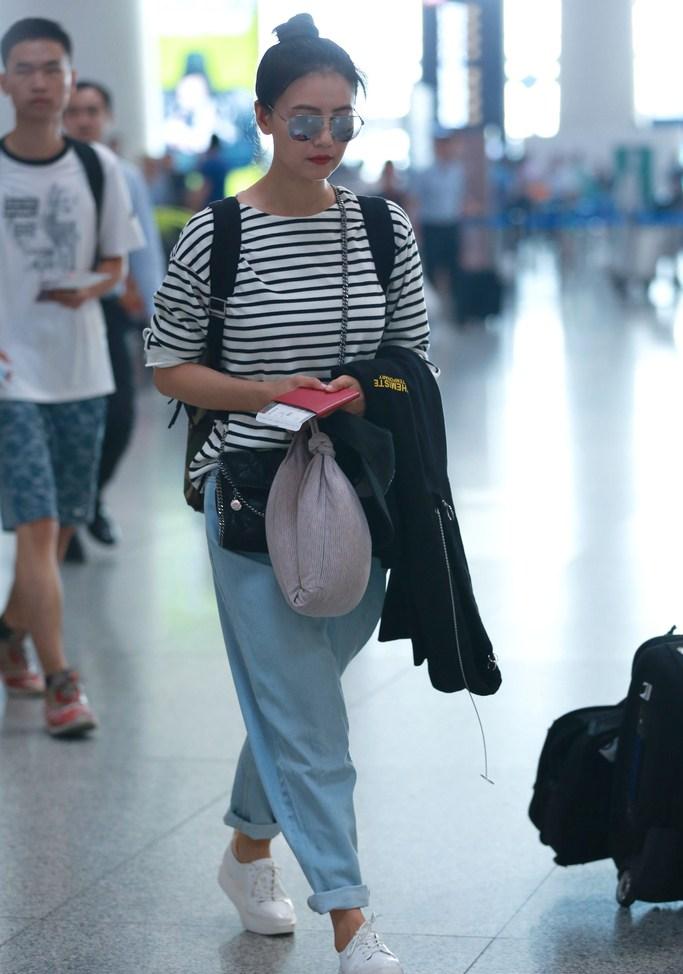 高圆圆提大箱变女汉子 飞加拿大与老公团聚