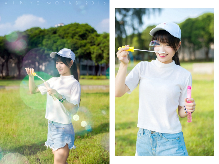 坐在草坪上吹泡泡清纯美女阳光气质写真照片