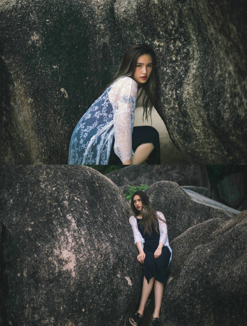 海岸礁石上的长发美女柔美秀发飘扬写真曝光