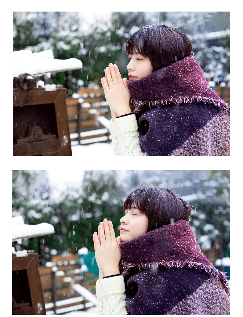 雪地内的黑发披肩美女温柔迷人写真